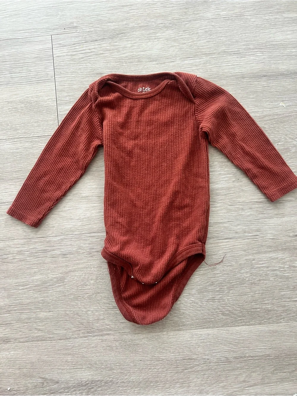 chick pea Rust Ribbed Long-Sleeve Baby One-Piece